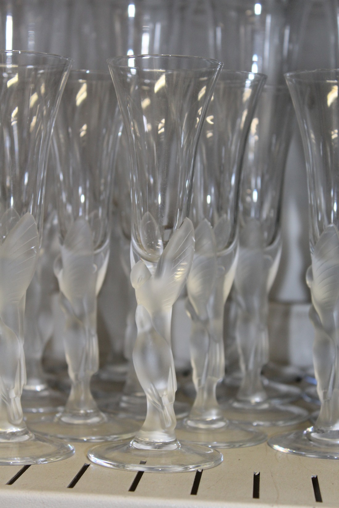 A suite of drinking glasses with frosted glass stems modelled as pairs of doves. - Image 3 of 3