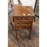 A 19th century mahogany three drawer drop flap work table.