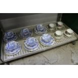 A group of Royal Worcester blue and white dragon decorated cups, saucers and plates, together with