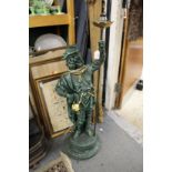 A large figural lamp base.