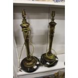 A pair of ornate table lamps.