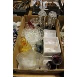 A box of decorative glassware.