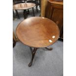 A 19th century mahogany tilt top tripod table.