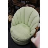An upholstered bedroom chair.