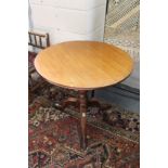 A 19th century mahogany circular tilt top tripod table.