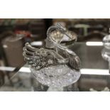 A swan shaped cut glass salt with plated mounts.