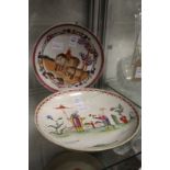 A Chinese Famille Rose circular dish depicting a figure on an elephant together with another dish (