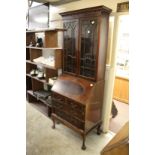 A mahogany bureau bookcase.