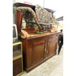 An Edwardian mahogany sideboard.