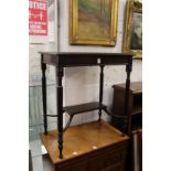 A mahogany two tier occasional table.