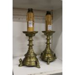 A pair of glass candlestick style lamps bases.