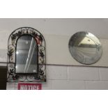 Two decorative mirrors.