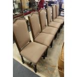 A set of six oak framed high back dining chairs.