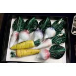 A small group of miniature Majolica glazed vegetables.