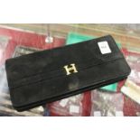 A ladies' velvet clutch bag.