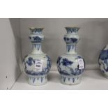 A pair of Chinese blue and white bottle vases.