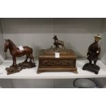 A Black Forest style carved wood casket and two other items.