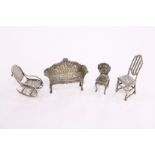 Miniature silver furniture to include a rocking chair.