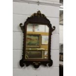 A Georgian style fretwork framed wall mirror.