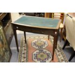 A mahogany two drawer writing table.