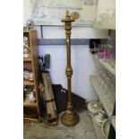 A giltwood standard lamp.