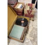 A quantity of gramophone records, LP's etc. including an old suitcase.