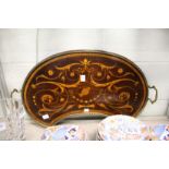 A good Edwardian inlaid mahogany kidney shaped tray with brass gallery and handles.