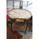 A French marble topped two tier occasional table.