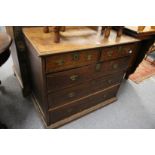 A George III oak chest of drawers.