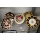 Five Crown Derby and other decorative cabinet plates and dishes.