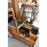 An oak dressing table and matching chair.