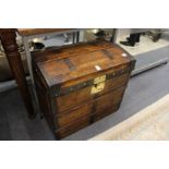 A good small dome top trunk with brass metal fittings.