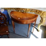 A good Sheraton revival inlaid satinwood and mahogany demi-lune foldover tea table.