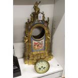 A 19th century ormolu mantle clock with Sevres style panels.