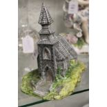 A Beswick model of a church.