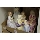 A group of porcelain figurines by Royal Worcester etc.