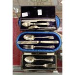 Three cased silver christening sets.