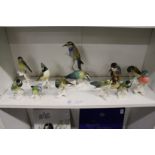 A group of Goebel bird ornaments.