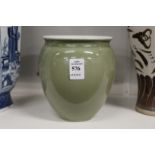 A Chinese Celadon coloured porcelain vase.