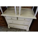 A painted pine chest of drawers.