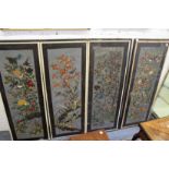 A late 19th / early 20th century Chinese painted paper four fold dressing screen, each panel