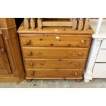 A pine chest of drawers.