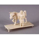A SMALL 19TH CENTURY INDIAN SECTIONAL CARVED IVORY HORSE AND GROOM.