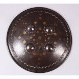 A 19TH CENTURY INDIAN INLAID SILVER & GOLD STEEL SHIELD, with four raised stud bosses, inlaid with