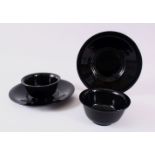 TWO CHINESE BLACK PEKING GLASS BOWL & PLATES, the bowls 11cm, the plates, 20cm. (4)