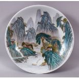 A MID-20TH CENTURY CHINESE LANDSCAPE DISH, depicting a vast mountainous setting with buildings,