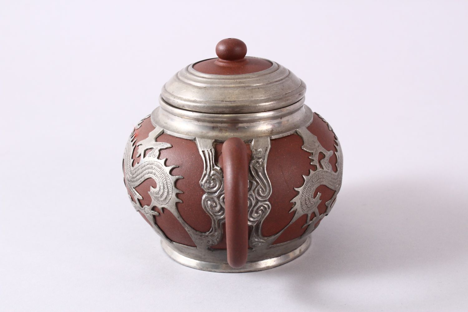A CHINESE YIXING CLAY & WHITE METAL DRAGON TEAPOT, The body of the teapot encapsulated with a carved - Image 4 of 9