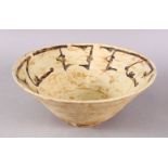 A GOOD IRAN STYLE POTTERY BOWL, decorated formal stylized script decoration in black upon beige