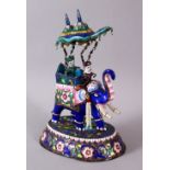 A 19TH / 20TH CENTURY INDIAN SILVER & ENAMEL MODEL OF AN ELEPHANT AND FIGURES, the elephant carrying