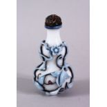 A GOOD CHINESE OVERLAY PEKING GLASS & AMBER GOURD FORMED SNUFF BOTTLE, the gourd formed snuff bottle